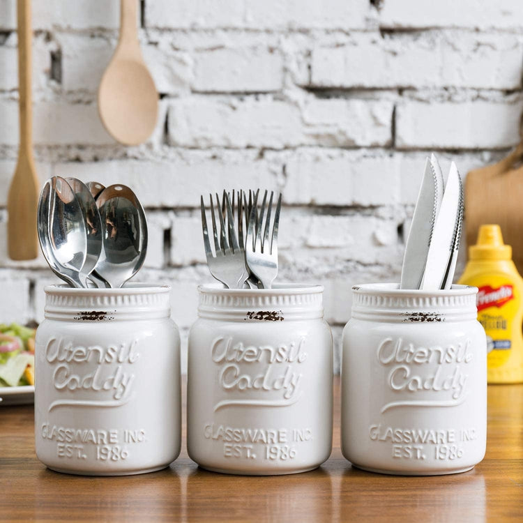 kitchen utensils on modern simple counter, kitchenware jars with