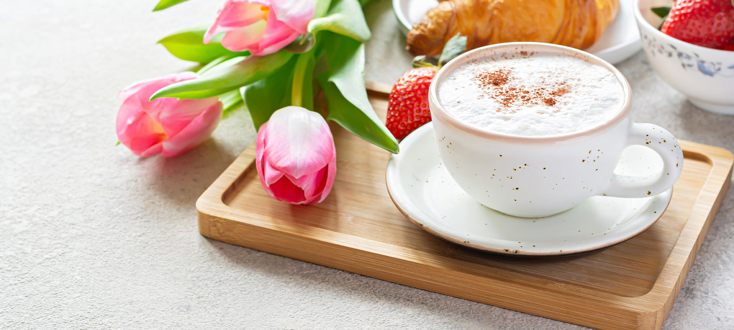 mother's day decor with flowers and coffee cup for moms